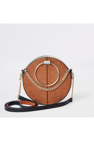 Beige ring handle circle cross body bag